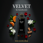 Perfume bottle labeled 'Velvet by InnoScents' surrounded by flowers, leaves, and oranges on a dark background.