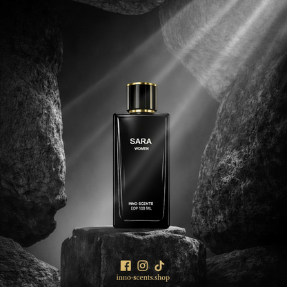 Perfume bottle labeled 'SARA' on a dark stone background