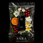 SARA perfume bottle with flowers and fruits on a reflective surface